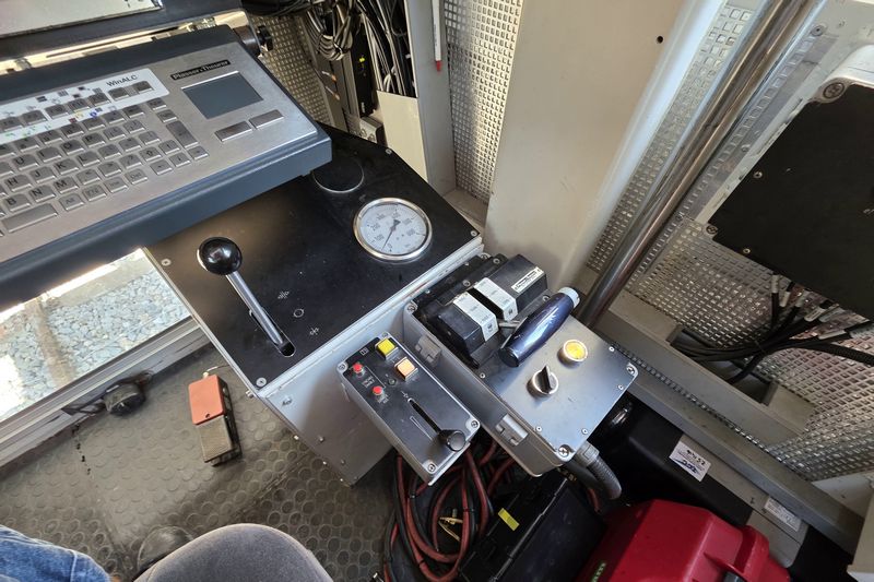 BAM Stopmachine met het fabrieksnummer 1214 en het UIC-nummer 99 84 942 8 702-7.